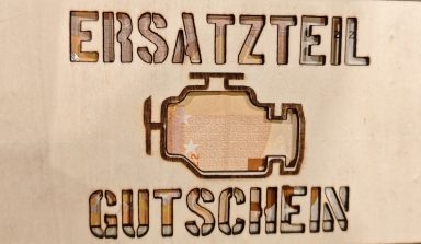 Gutschein für Ersatzteile mit einem Ausschnitt eines Motorsymbols.